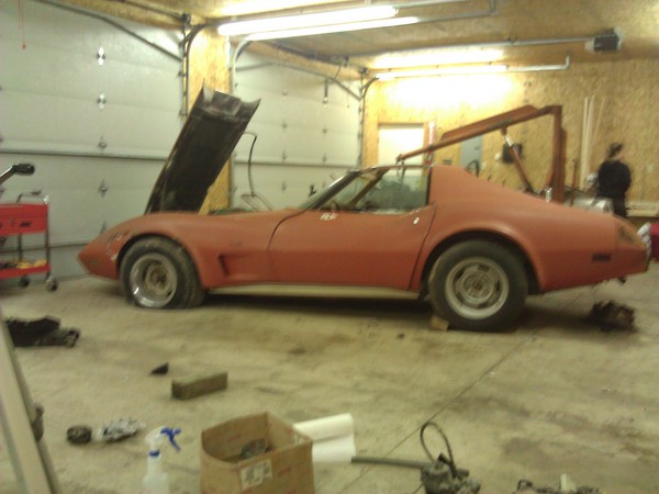 This orange C3 Corvette looks great from the driver side. The passenger side is another story.