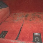 Carpet and rear compartment from a 1984 C4 Corvette before being restored