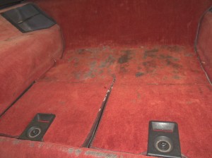 Carpet and rear compartment from a 1984 C4 Corvette before being restored